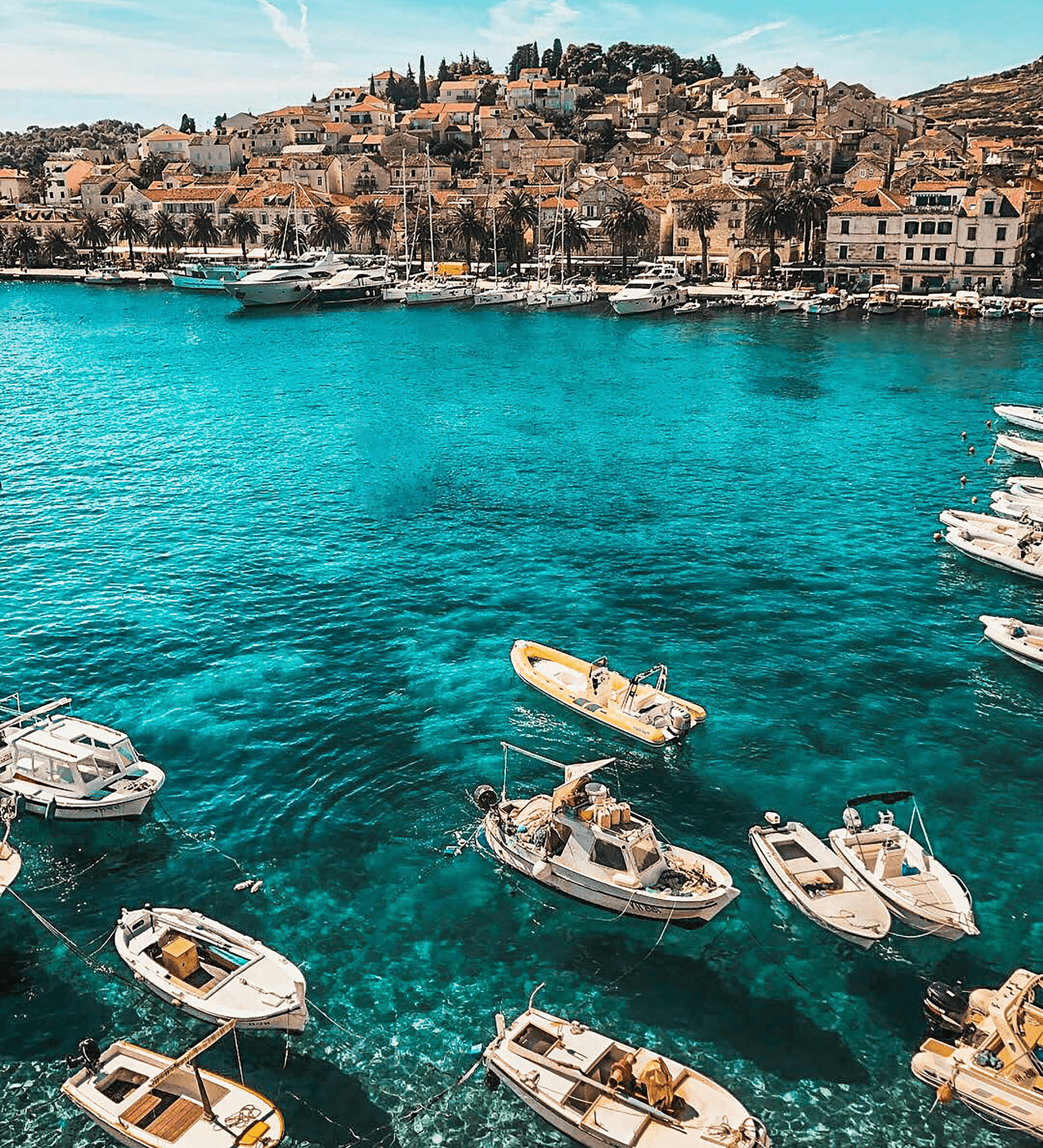 A lake image with boats inside the lake